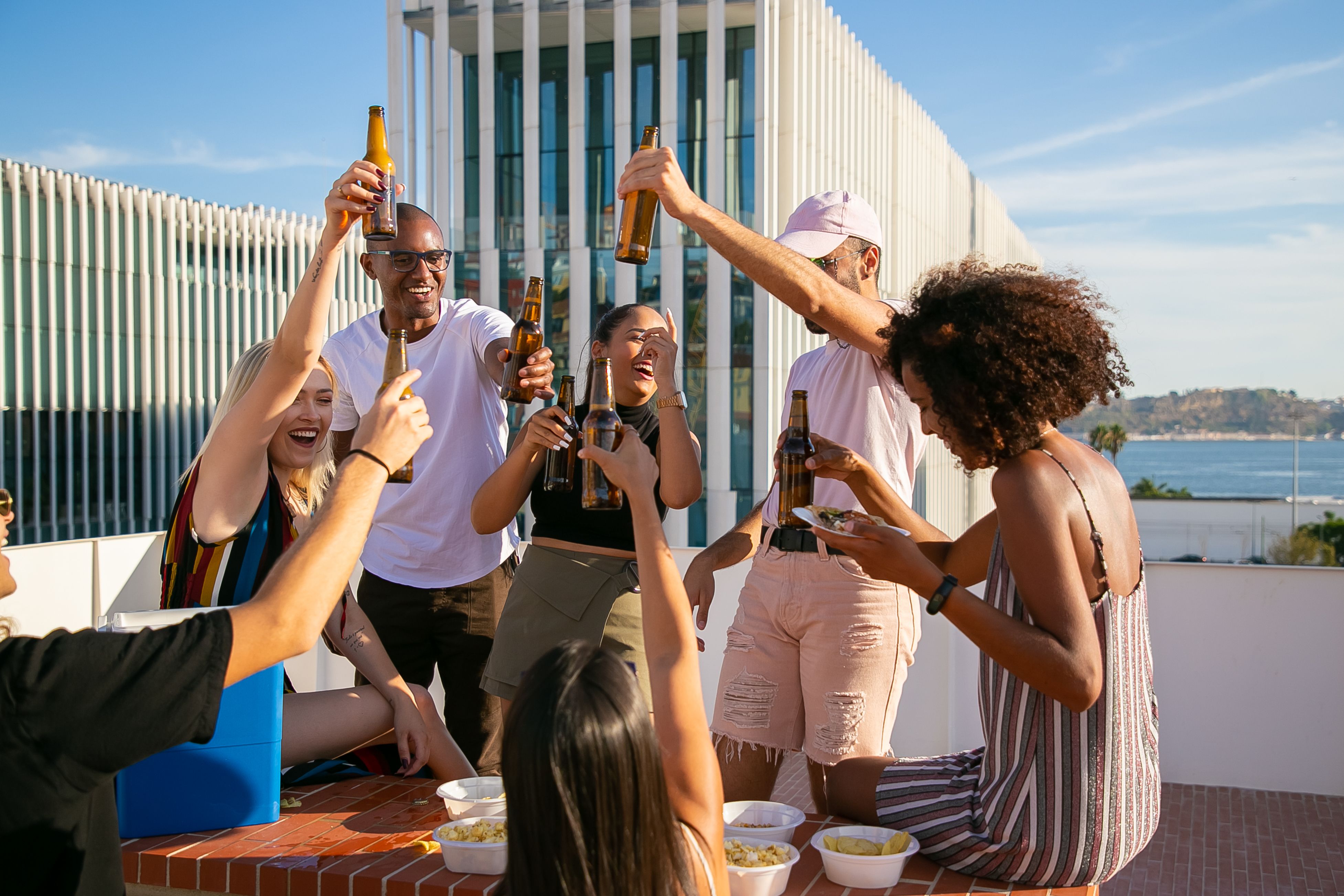 Friends enjoying a rooftop social experience together